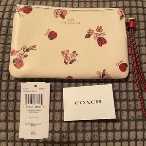 Coach wristlet with Ladybug 🐞🐞Floral print